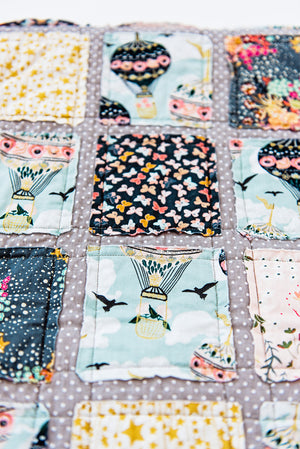 whimsical-patchwork-baby-quilt